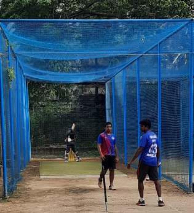 Enclosed Turf Cricket Practice Net with Floodlights